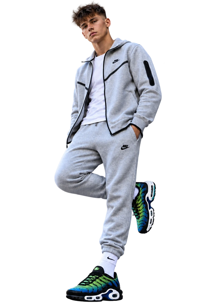 Ragazzo del biglietto, tuta grigia e sneakers blu e verdi